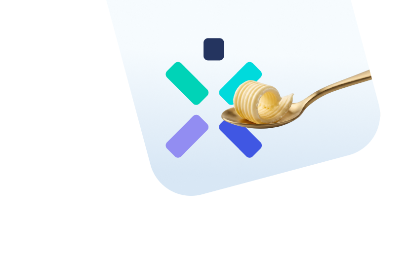 Sviesto gabalėlis šaukšte, o fone Ignitis logotipas.