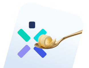 Sviesto gabalėlis šaukšte, o fone Ignitis logotipas.
