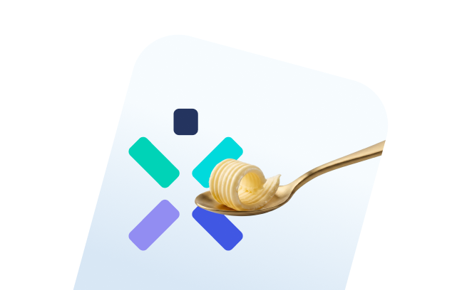 Sviesto gabalėlis šaukšte, o fone Ignitis logotipas.