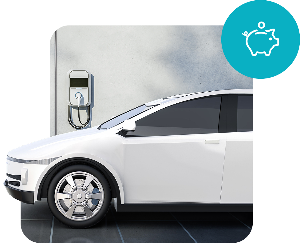 Baltas elektromobilis stovintis šalia namuose įrengtos įkrovimo stotelės.