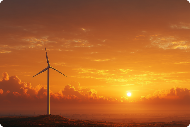 Vėjo parkas saulėlydžio fone.